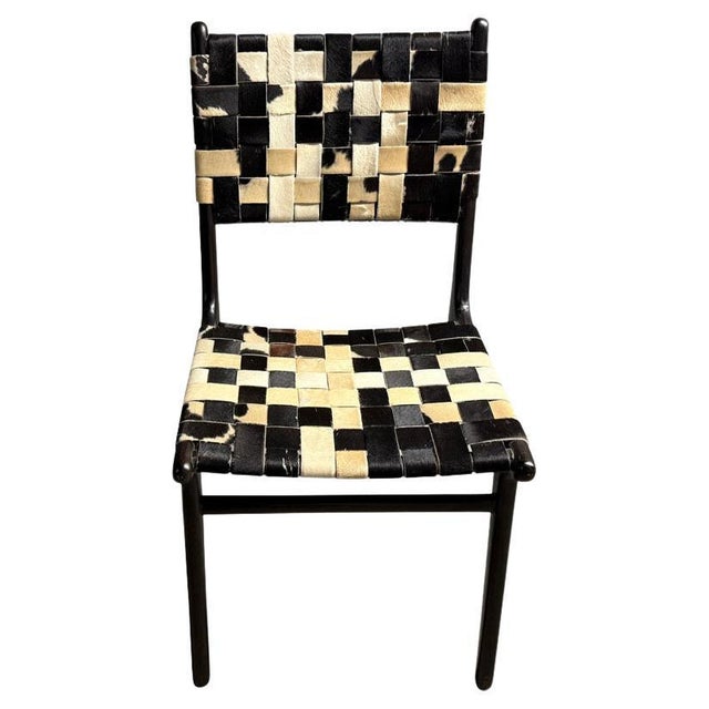 Premium quality double-back hand woven cowhide with a teak frame. We utilize the finest quality cowhide for our modern...