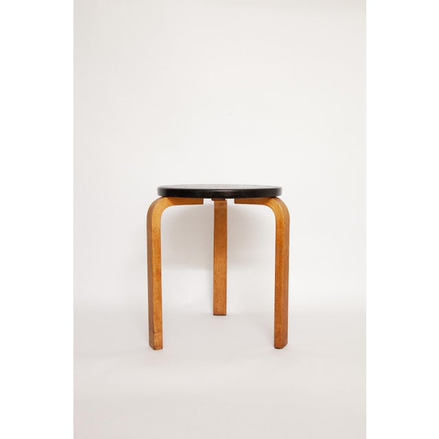 The stool on offer is a very early and rare version with a solid wood seat, manufactured by Aalto Design in Hedemora,...