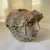 This striking vintage figural face planter dates to the 1980s and is crafted from cast stone (cast concrete). Featuring a...