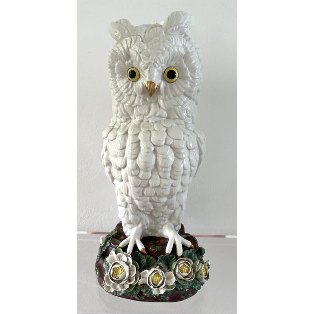 Mottahedeh porcelain figure of owl. White owl figure perched on floral ground; old paper label on underside. Could also be...