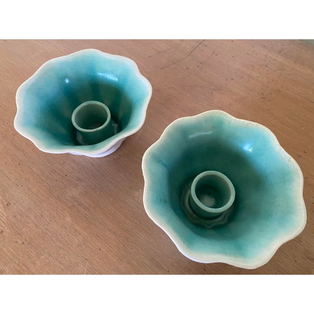A rare pair of mid-century pottery candleholders by Winfield Pottery of Pasadena, California. A very uncommon form to find...