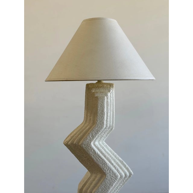W19 D19 H62.5 Sculptural 1980s postmodern floor lamp featuring a plaster construction with a dramatic zig-zag silhouette...
