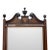 An elegant Edwardian cheval mirror crafted in the George III style. The piece features a prominent broken swan-neck...