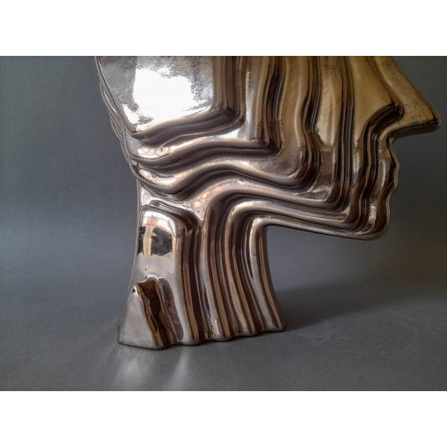 Stoneware sculpture, made with the pouring technique, single fired at 1230° with third fire platinum. Author Francesco...