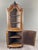 Corner Marquetry Display Cabinet – 19th Century A superb corner marquetry display cabinet in wood, dating from the 19th...