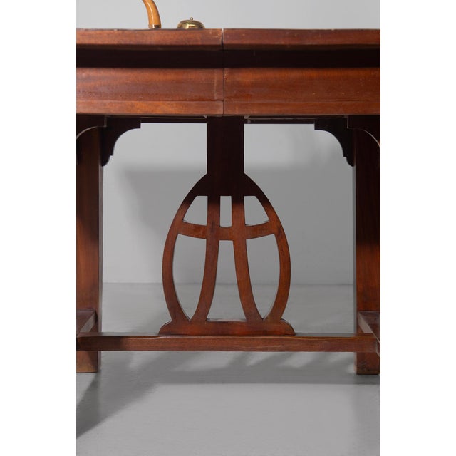 Art Nouveau Italian Walnut Extendable Dining Table with Lyre Motif Base, 1905, in Very Good conditions. Designed 1890 to 1919