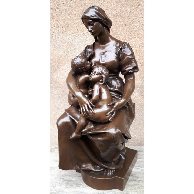 Magnificent composition for this bronze sculpture with brown patina. Charity (such is the name of the work) is represented...
