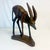 We are pleased to offer this fabulous hand-carved Gazelle. The sculpture is crafted from a solid piece of Walnut wood. It...