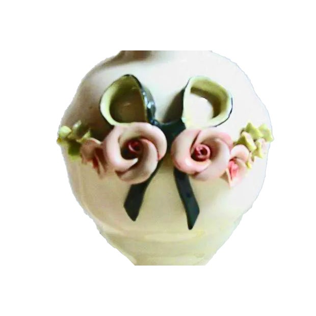 Lovely feminine porcelain lamp with delicate green ribbons and pink rose blossoms with matching harp and porcelain finial...