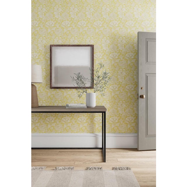 Chrysanthemum was originally designed as a wallpaper by William Morris in 1877 with winding blooms against a foliage...