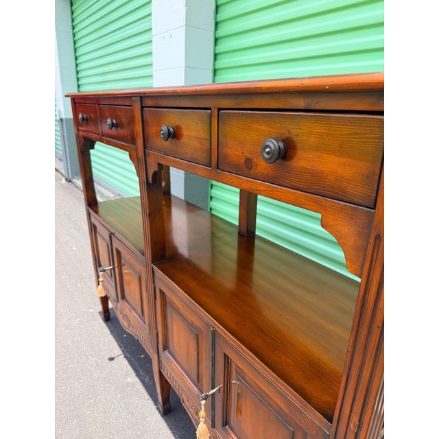 Theodore Alexander console server, crafted with exceptional detail and rich warm wood tones. 56" long x 18" deep x 44"...