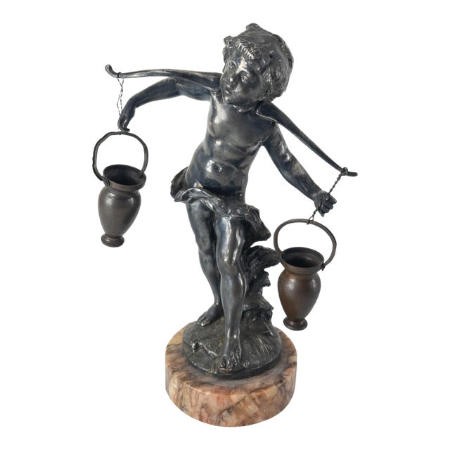 Silvered Metal Figure of a Boy Carrying Water For Sale
