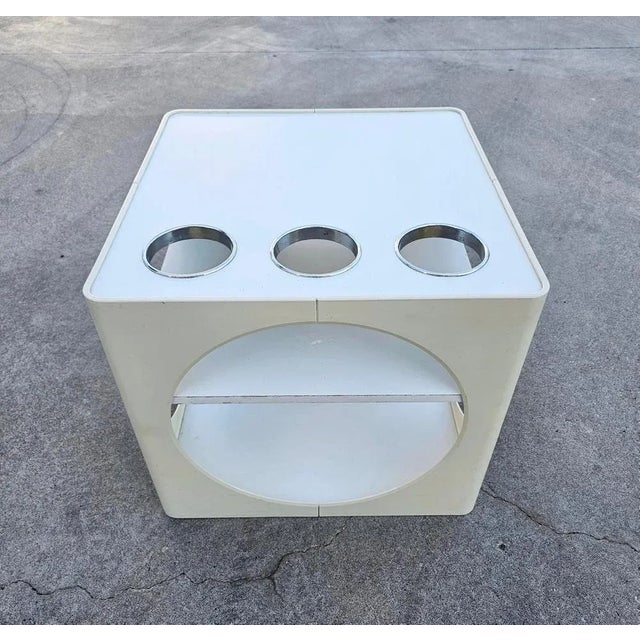 In this listing you will find a very rare Space Age Cube bar or side table with 3 bottle holders and a small shelf. It is...