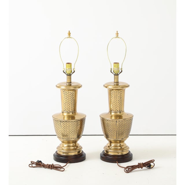 1980's Mid-century modern brass table lamps with wood base by Frederick Cooper, in vintage original condition with some...