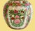 Vintage Chinese Famille Rose ginger jar or round vase, often referred to as Rose Medallion porcelain. It features...