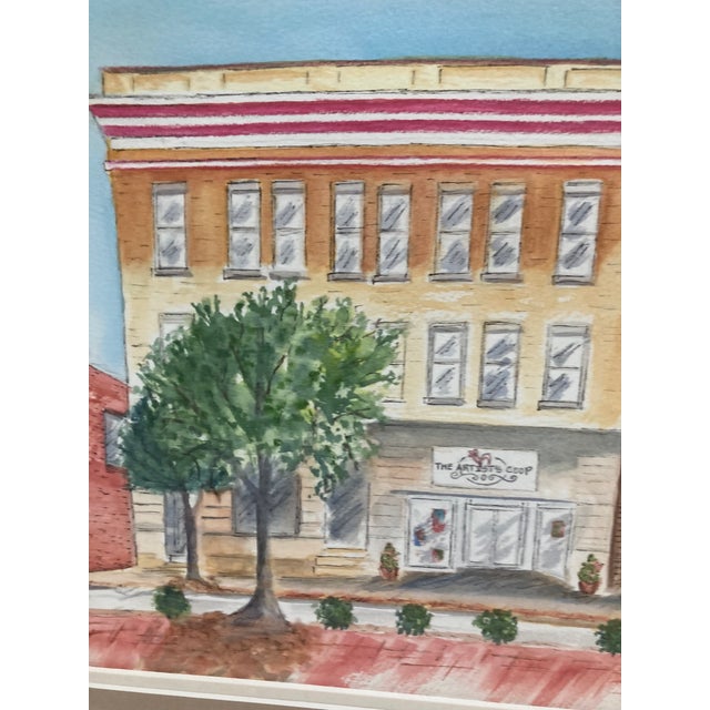 This is an original watercolor by South Carolina artist Dana Gonzalez of historic buildings located on the Public Square...