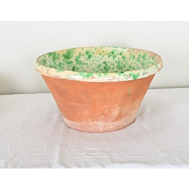 A painterly passata bowl from the Puglia region of Italy, dating to the 19th century. The large terracotta bowl features a...