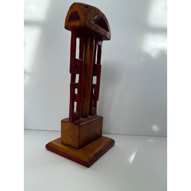 A great table decoration or addition to your folk art collection is this vintage hand carved and painted whimsy in a chain...