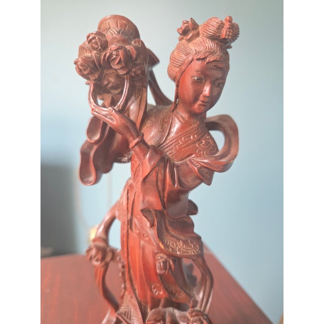 This stunning hand-carved wooden figure depicts a Celestial Maiden, a revered spiritual being in Chinese mythology and...