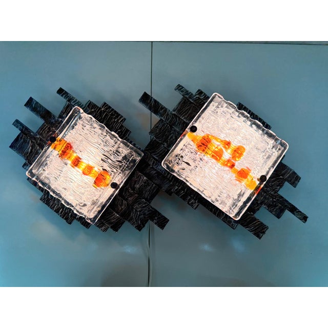 One wall lamp from the 1960s/70s, two-light, E27 sockets. The design is attributed to Albano Poli for Poliarte (see...