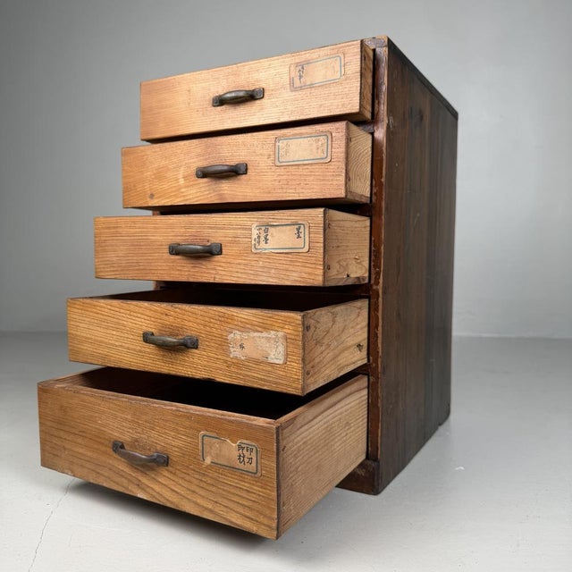 This compact Japanese archive cabinet with five drawers is a rare find where functionality and aesthetics come together...