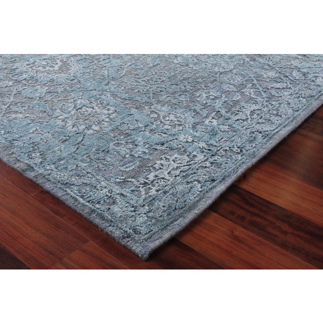 The Bryant rug reinvents traditional motifs through a contemporary color palette and unique play in texture. Stylized...