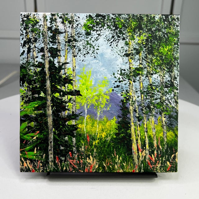 This original acrylic painting brings the serenity of nature into your space. A vibrant forest scene with rich, textured...