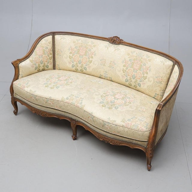 Rococo Style Three-Seater Sofa with Gilt Wooden Frame and Floral Brocade Upholstery, 1920s, in Good conditions. Designed...