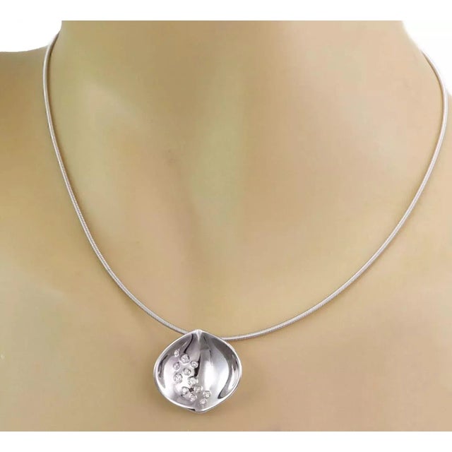 This elegant authentic necklace is by designer Koesia, it is crafted from 18k white gold with a high polished finish. The...