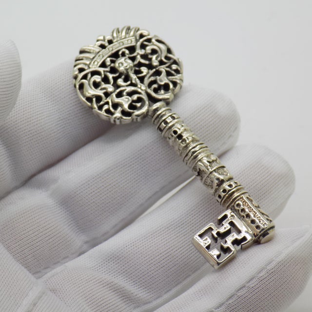 An enchanting vintage object depicting a life size decorative key, handcrafted in Padua, Italy between the 1980s and 1990s...