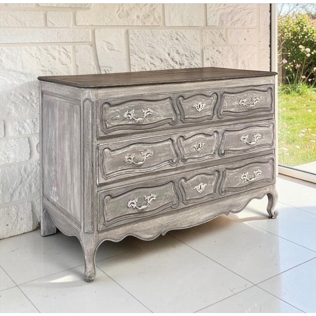 Authentic 18th century Country French commode combines the relaxed beauty of a softly painted finish with the warmth of a...