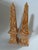 A matching pair of one of a kind decorative obelisks featuring a hand painted Chinese style faux bois design with tones of...