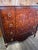 A strikingly handsome tall chest of drawers in a brown tortoise shell lacquer finish by John Widdicomb Furniture. This...