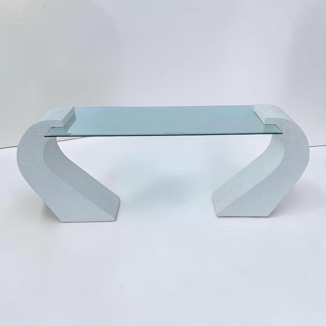 Very unique 1980s postmodern curved plaster consult table. This piece consists of two wooden pedestals in a textured...