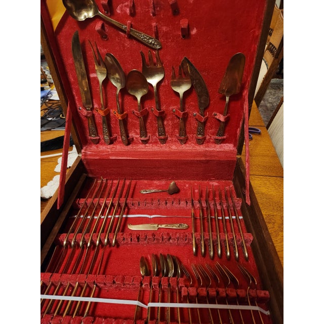 This elegant hand-cast vintage 1960's 85-piece set of solid Bronze Thai Buddha Siam flatware is an lovely addition to any...