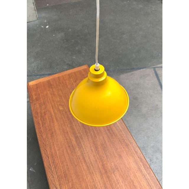 Simple pendulum from the Danish manufacturer Nordisk Solar. A very reduced design that is based on the shape of the...