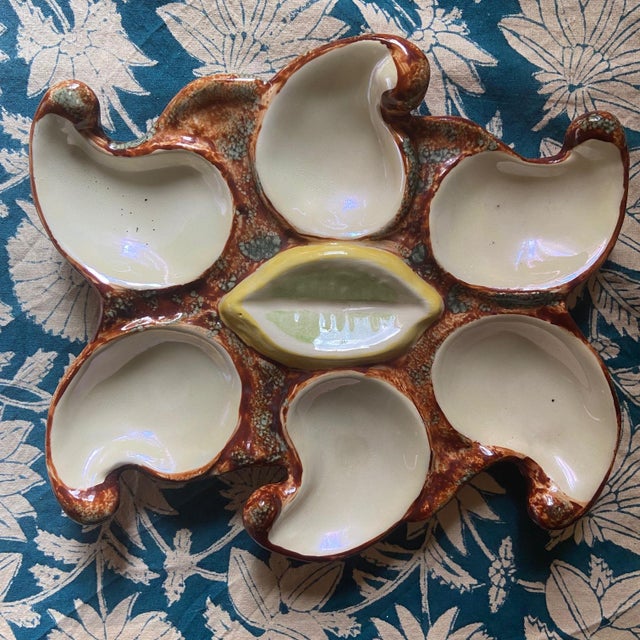 For a gourmet oyster meal. These vintage oyster French plates are as beautiful as they are surprising. Good condition with...