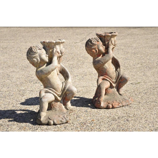 Vintage Cast Terracotta Figural 28" Cherub Putti Garden Planter Pots - a Pair. Item features cast terracotta construction,...