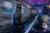 This oil on panel artwork captures a moody train station scene, where a solitary figure stands in dim light, surrounded by...