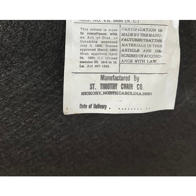 St. Timothy Chair Company. Pair of Queen Anne style library chairs. Beautiful maroon leather accented with brass nail...