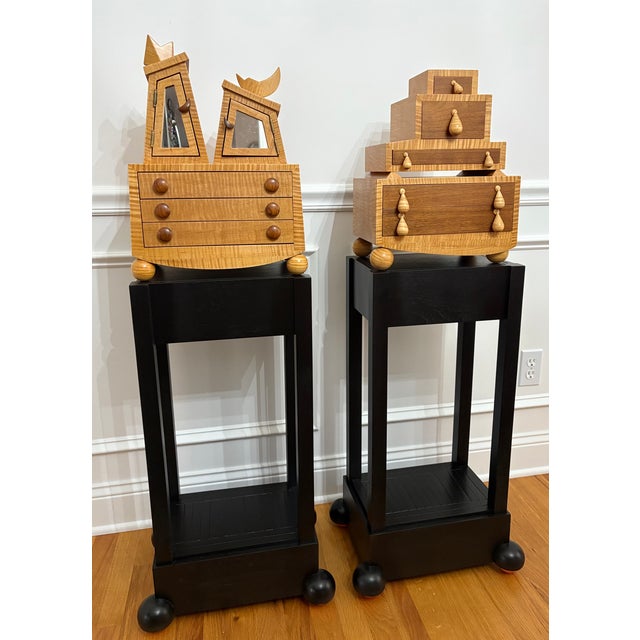 Jewelry boxes with stands, a combination of walnut and curly maple. Each box comes with its own stained walnut stand. The...