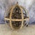 Add rustic character to your home with this large wood-and-metal orb chandelier, believed to be from the Yosemite Home...