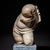 Small marble sculpture preserved in fragmentary condition and mounted on a modern stone cube base. The surviving torso...
