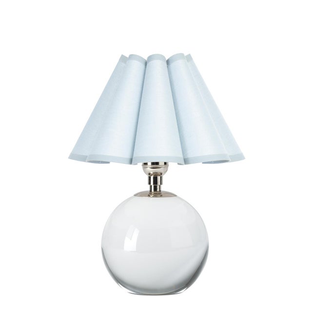 The Giorgio Mini Table Lamp provides a soft, inviting glow through its mist blue scalloped shade, making it a perfect...