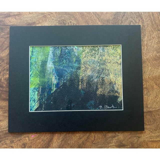 A richly textured abstract inspired by filtered light moving through a woodland landscape. Layers of deep indigo, moss...