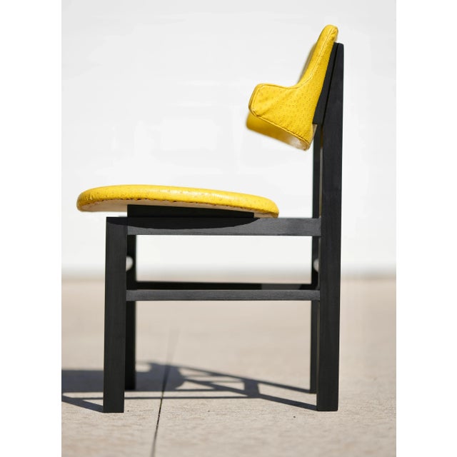 Mid 1950s Edward Wormley designed model 675 chairs for Dunbar. All original, vibrant yellow faux ostrich upholstery on...