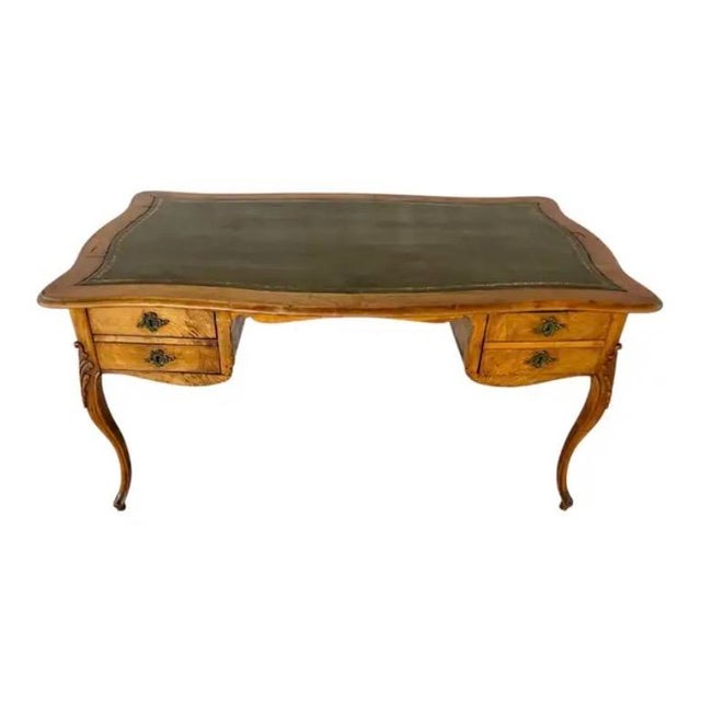 Louis XV Fruitwood Bureau Plat. This writing desk features a dark green leather inset top with expansive rectangular...