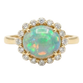 Natural Opal 1.05cts & Diamond 0.15cts Ring in 18k Gold For Sale