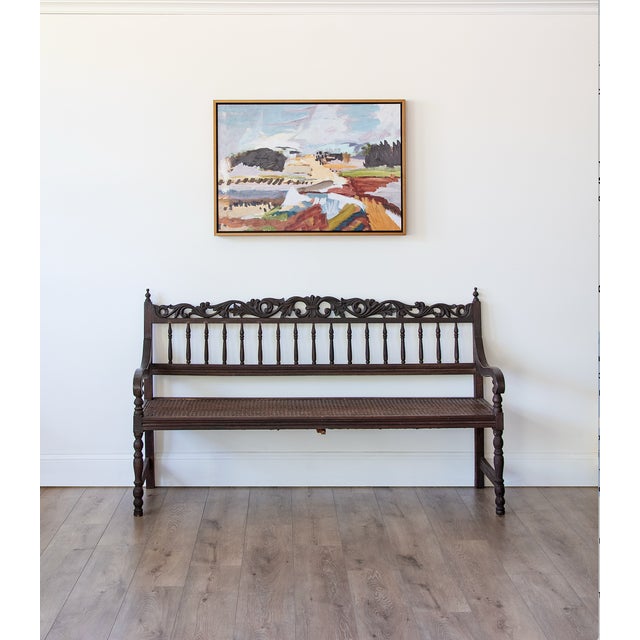 Crafted in British colonies during the late 19th century, this Anglo-Indian hall bench beautifully reflects the fusion of...