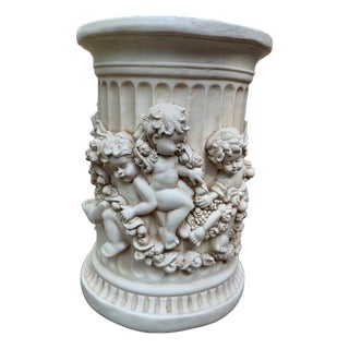 Decorative Corinthian Column in Classical Style With Cherubs Holding a Floral Swag For Sale